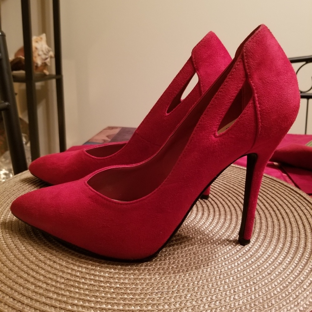 Red pointed toe pumps